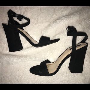Black heeled strappy sandals
